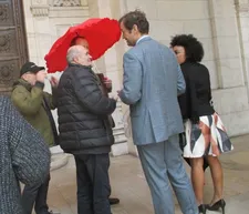 Volker Schlöndorff, Colm Tóibín, Mathias Sanders and Isioma Laborde-Edozien with Stellan Skarsgård under the umbrella
